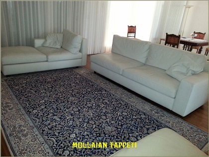 Mollaian Lecce ambientazione tappeto classico nain persia nel ambiente tutto moderno e lineare 